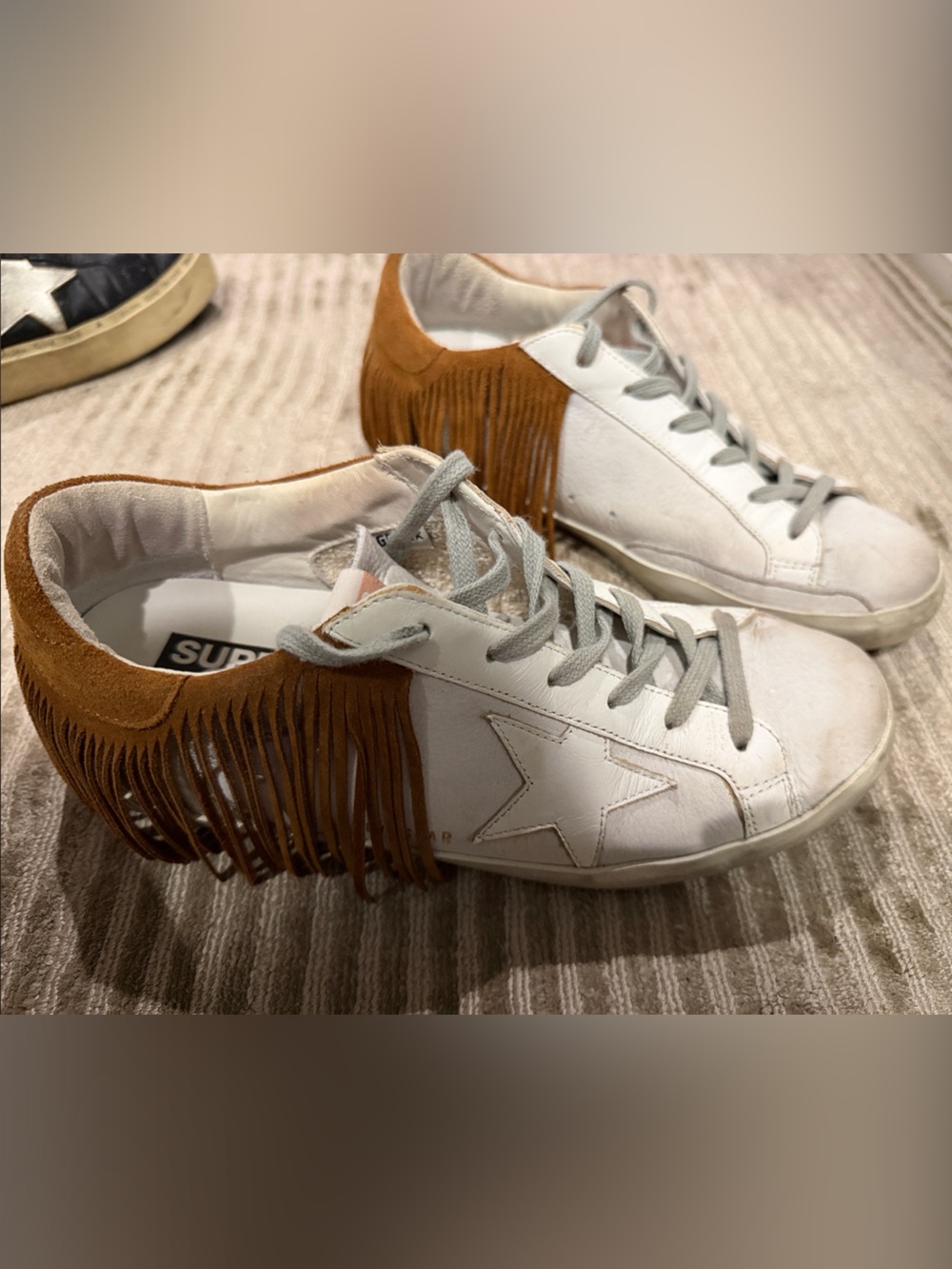 Golden Goose Women’s White Nubuck Low Top Super Star with Brown suede fringe.
